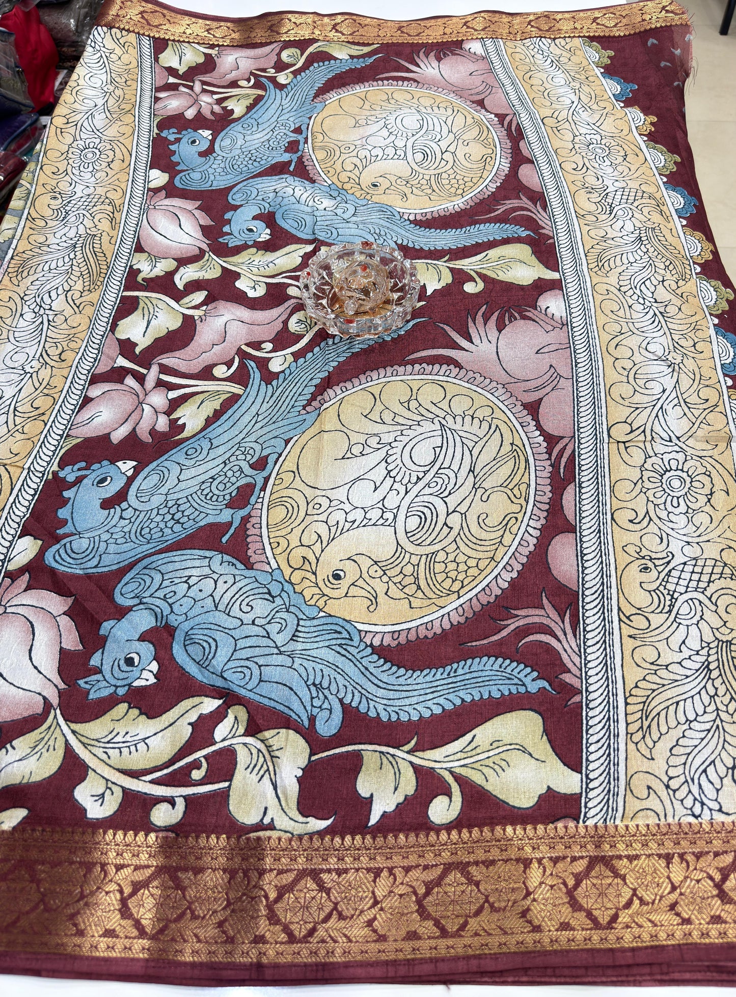 Silk blend printed saree with floral and bird motifs, zari border, women’s festive wear saree