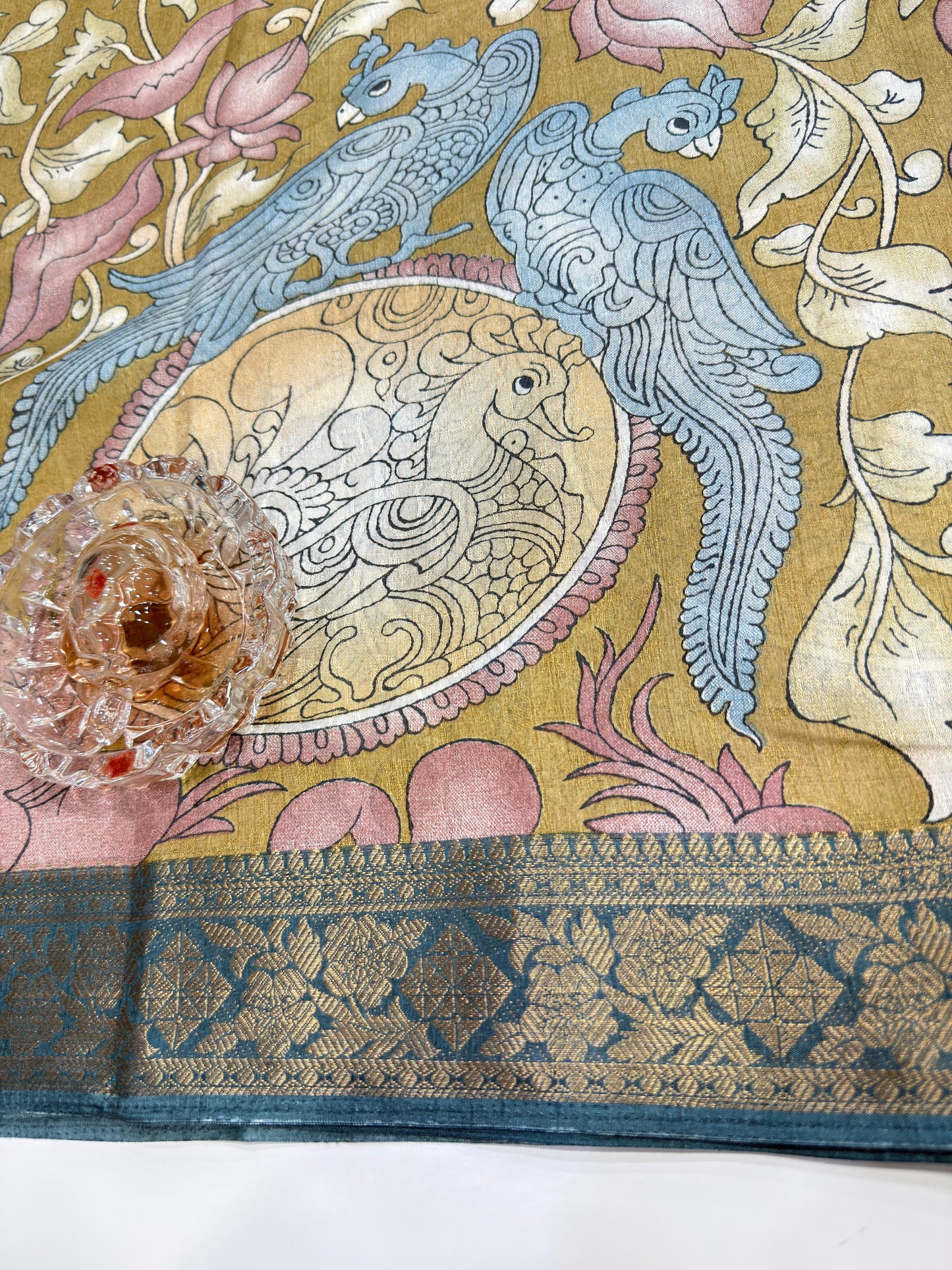 Silk blend printed saree with floral and bird motifs, zari border, women’s festive wear saree