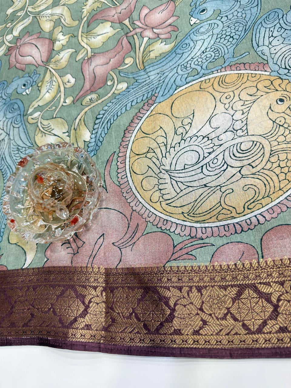 Silk blend printed saree with floral and bird motifs, zari border, women’s festive wear saree