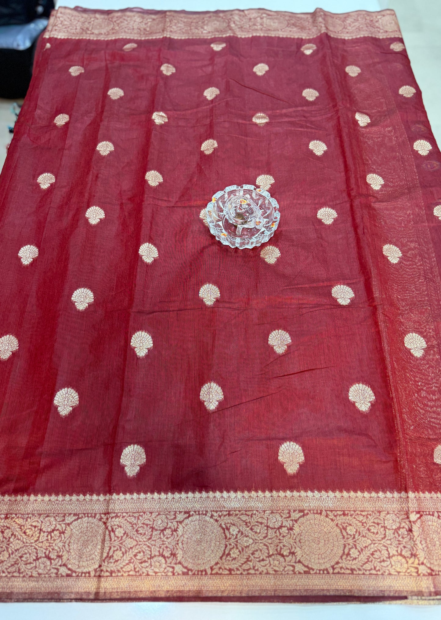 Modal silk saree with woven buttas and peacock pallu for women