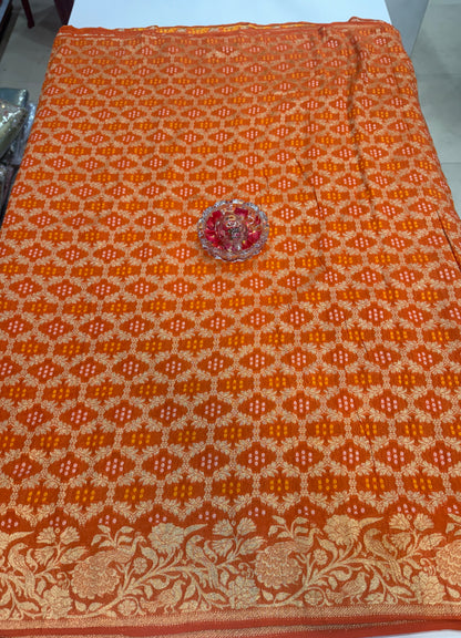 Pure Kaddi Georgette Zari Weaving Saree in Rust-Orange with Bandhani-Inspired Pattern and Antique Gold Border – Festive & Wedding Wear for Women