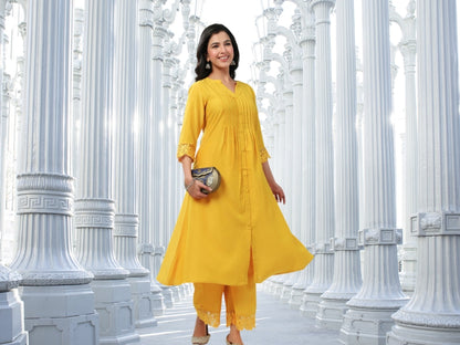 Muslin A-Line Kurta Pant Set for Women with Pleated Front and Embroidered Sleeve Detail