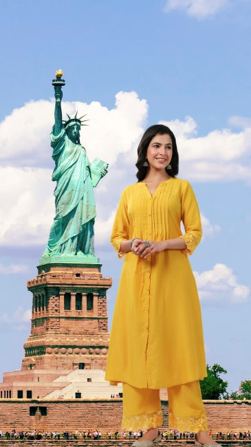 Muslin A-Line Kurta Pant Set for Women with Pleated Front and Embroidered Sleeve Detail