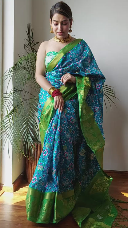 Semi Raw Silk Jacquard Saree with Silver and Gold Zari Butti Weaving – Contrast Ikkat Blouse