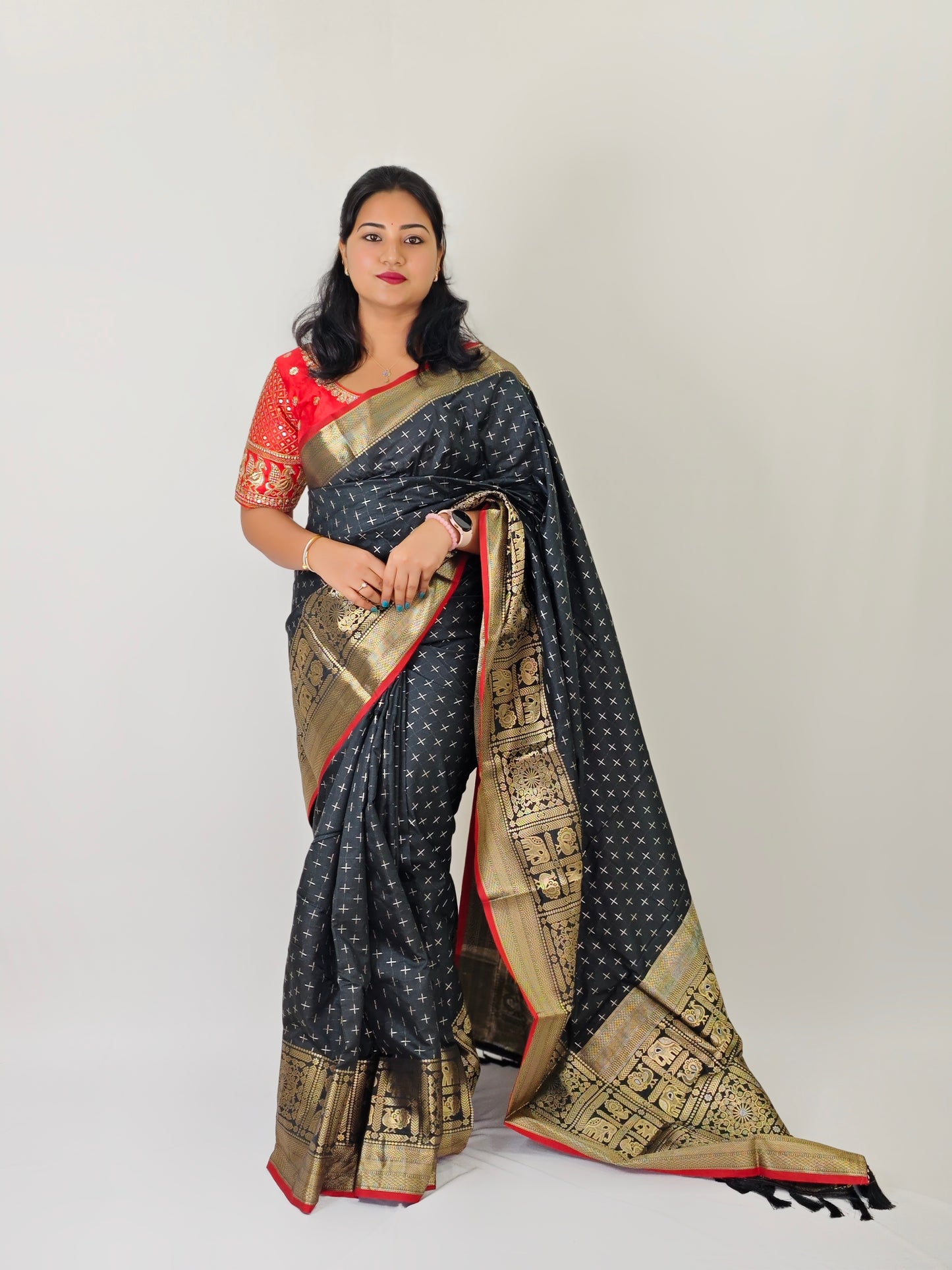 Soft Silk Saree with Rich gold Zari border and plus mark pattern elephant and peacock motifs