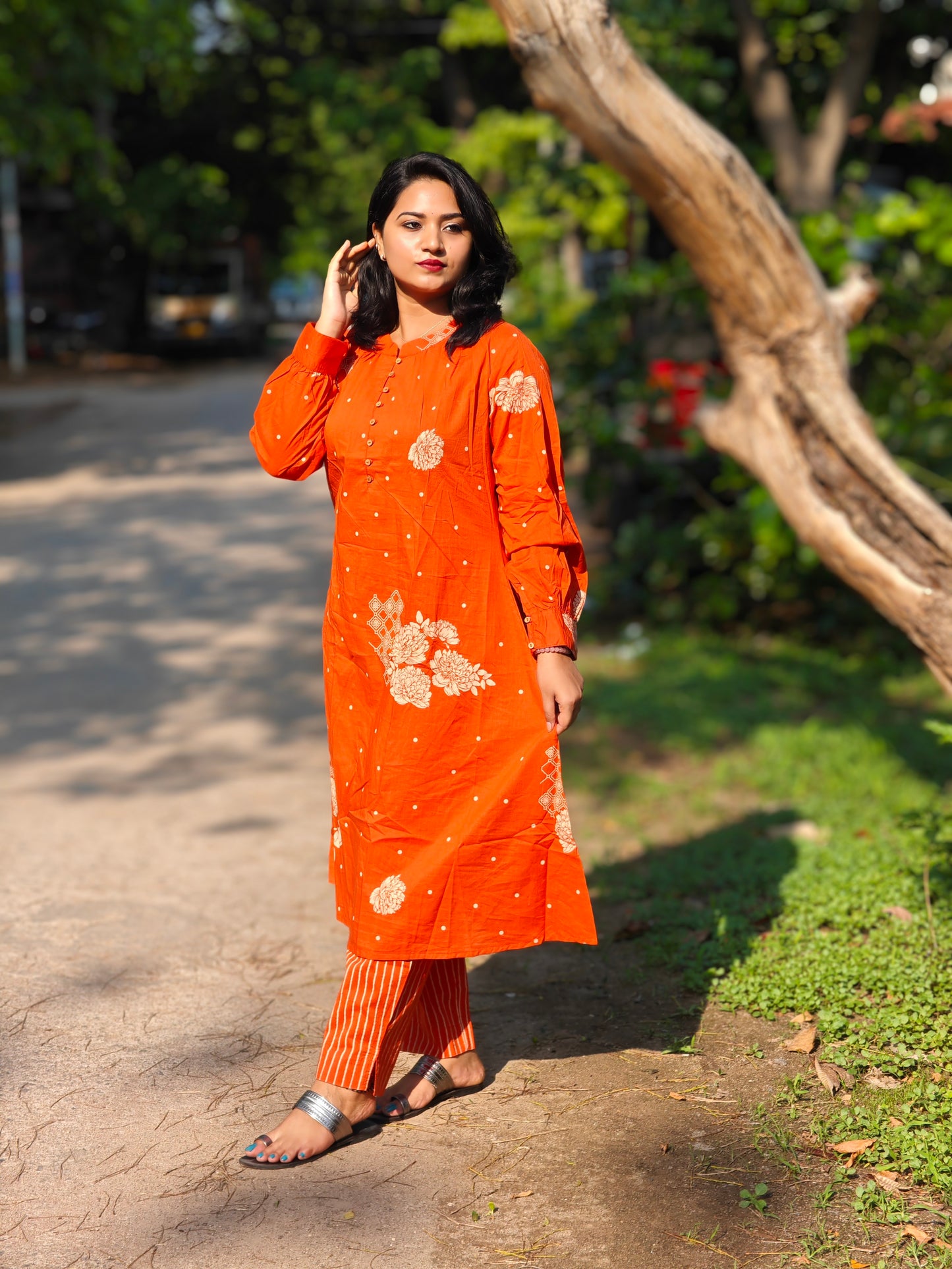 Orange Cotton Floral Printed Kurta Pant Set for Women with Striped Bottom and Long Sleeves