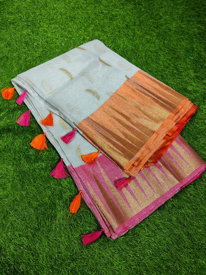 Banarasi tissue soft silk saree with booti weaving, tassels and designer rich pallu for festive wear