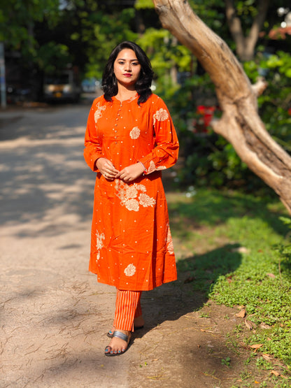 Orange Cotton Floral Printed Kurta Pant Set for Women with Striped Bottom and Long Sleeves