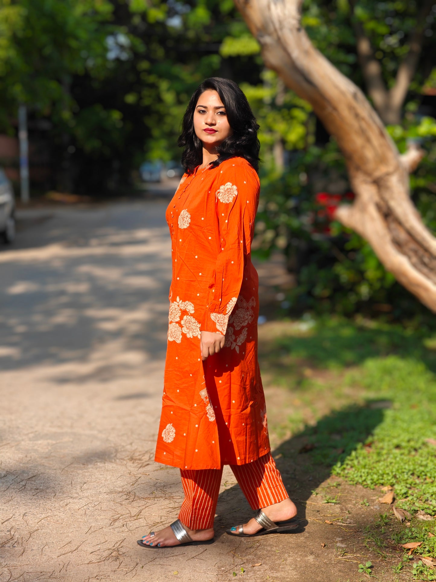Orange Cotton Floral Printed Kurta Pant Set for Women with Striped Bottom and Long Sleeves