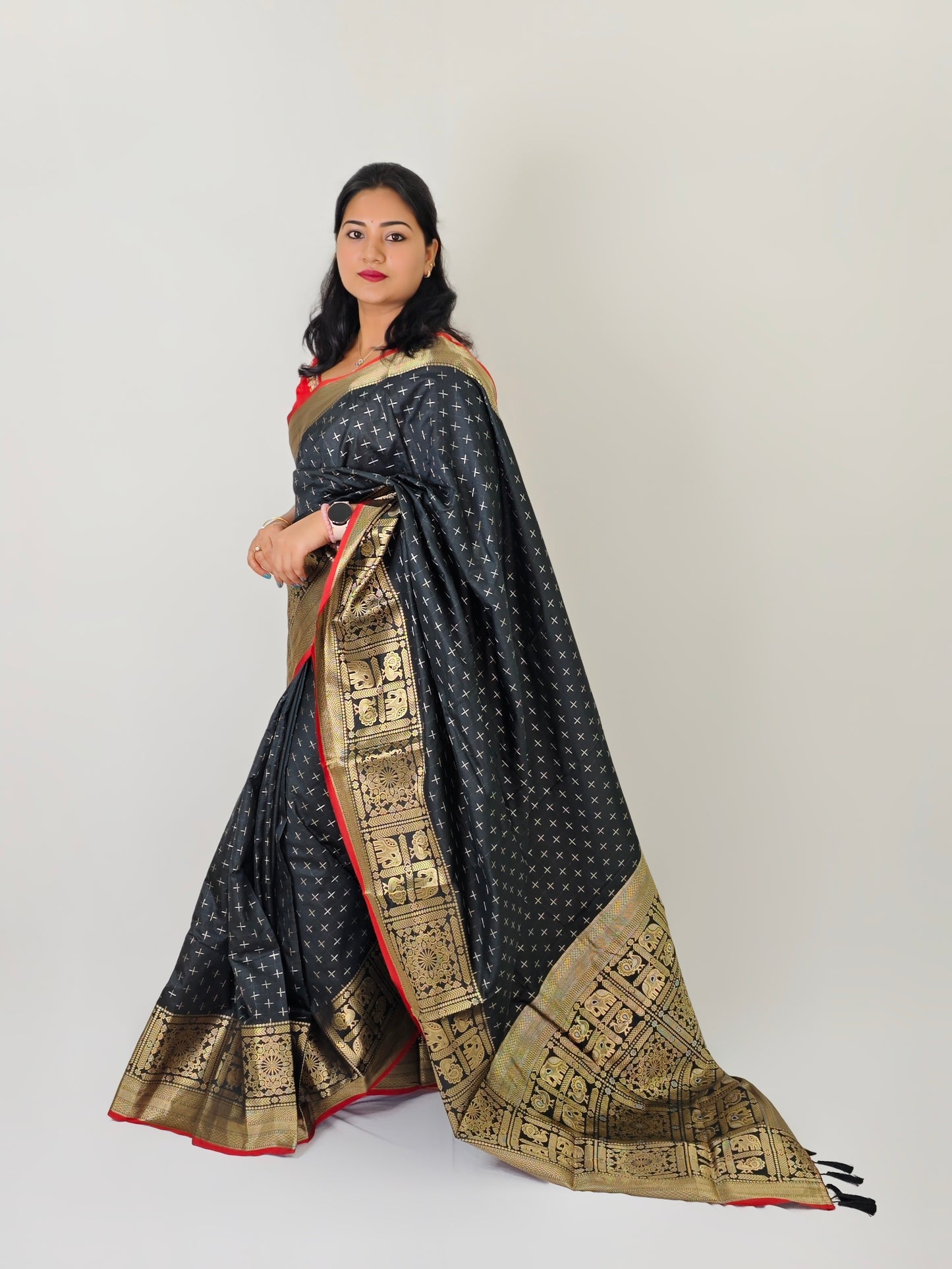 Soft Silk Saree with Rich gold Zari border and plus mark pattern elephant and peacock motifs